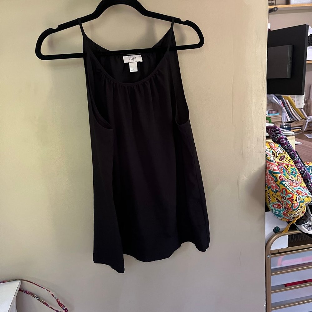 Sleeveless black blouse
